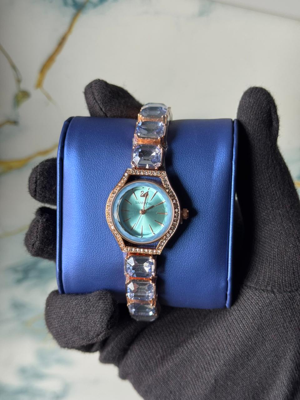 Swarovski Eternal watch featuring a crystal-adorned bracelet and a sunray dial