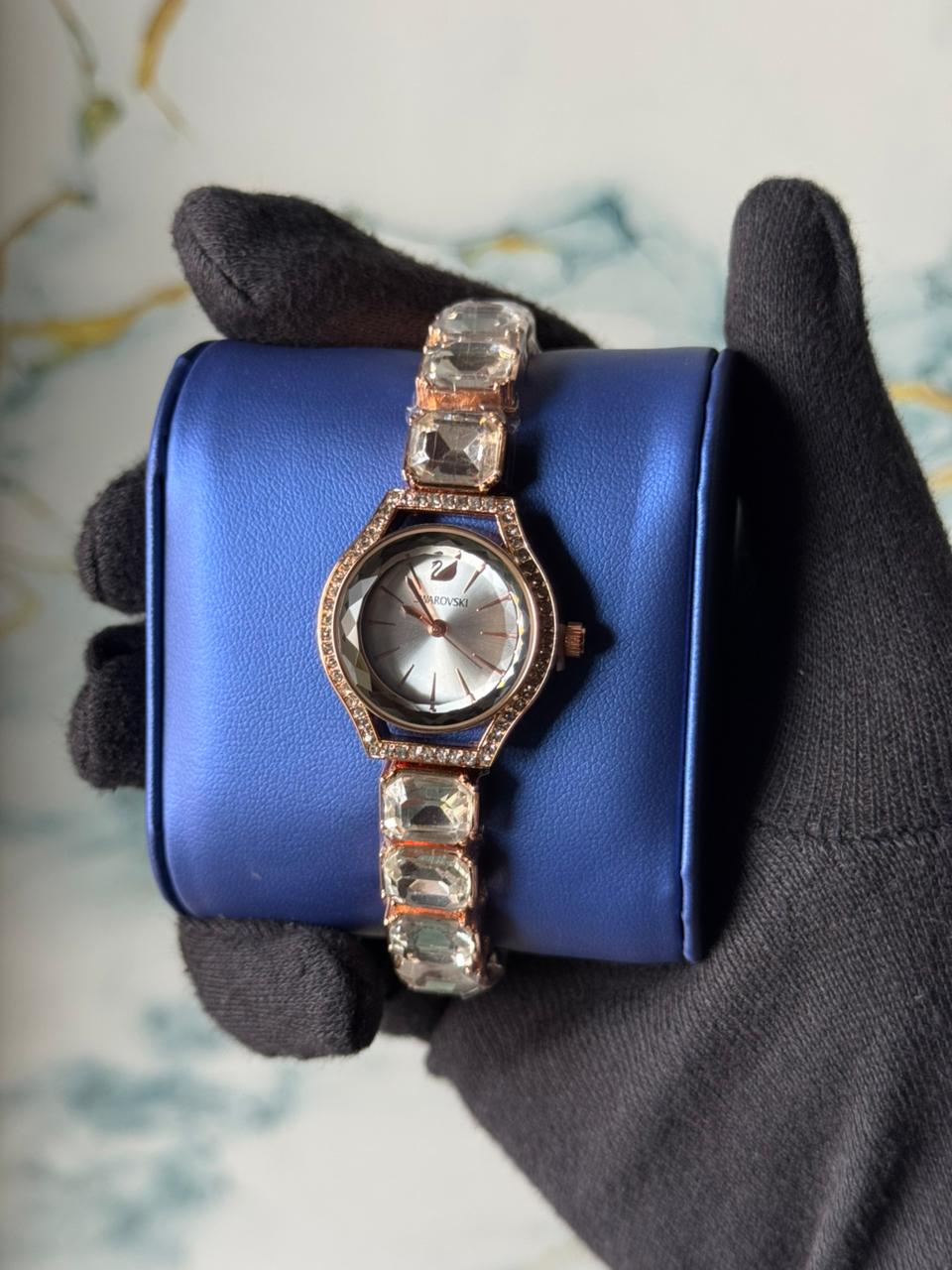 Swarovski Eternal watch featuring a crystal-adorned bracelet and a sunray dial