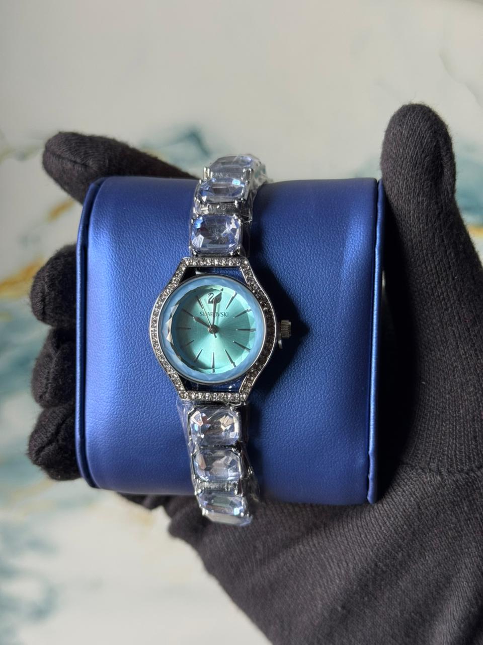 Swarovski Eternal watch featuring a crystal-adorned bracelet and a sunray dial